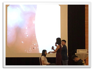 Performing nasal endoscopy live on stage in front of an audience of 300, March 2018