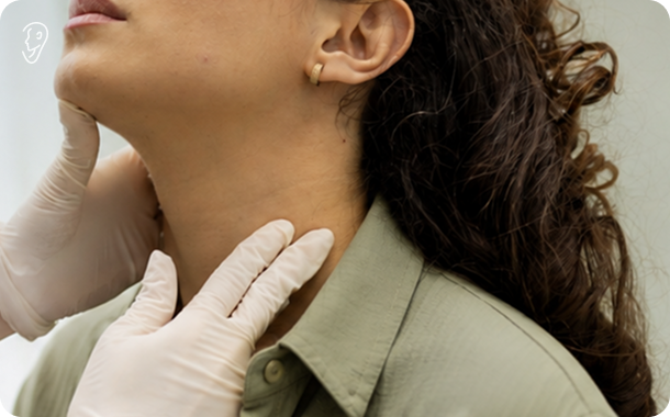 Woman examining her throat by doctor