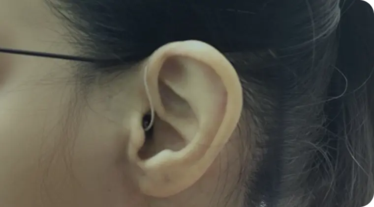 woman wearing ear piece